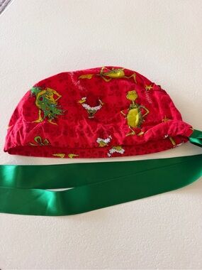 Red Grinch Print Surgical Scrub Cap with Green Tie